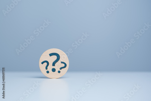 Finding or Searching for idea concept, search for information, find out. Find the answer. Wooden circle with question mark icons. Discovery new innovation. Ask, FAQ, Advice, Support, Problem solution.