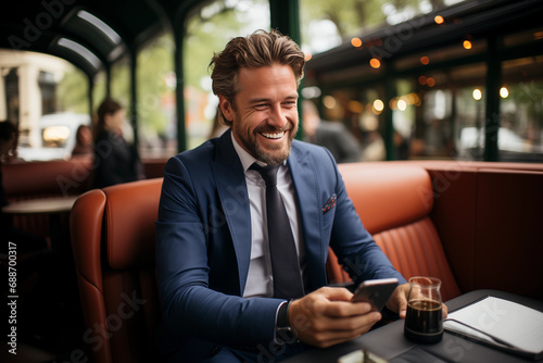stylish caucasian man enjoying coffee in a tram-themed cafe