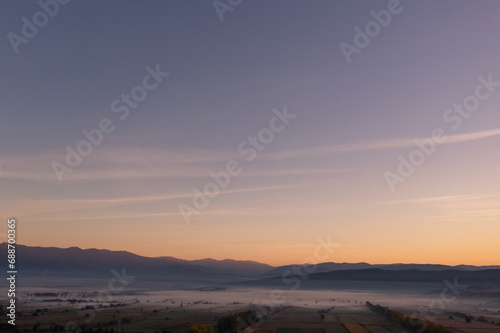 aerial view of foggy morning autumn mountains with clouds bansko bulgaria