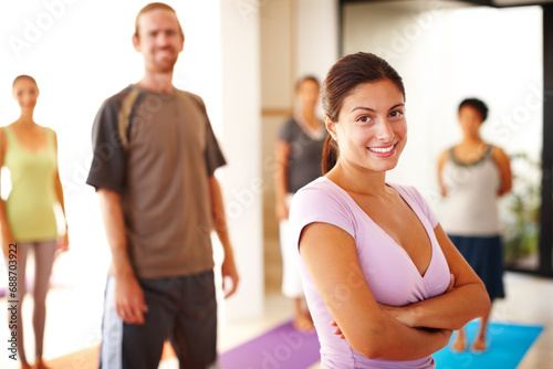 Portrait, smile and confidence, woman in yoga class for fitness, commitment and body wellness. Pilates, men and women in gym together in holistic health, mindfulness and happy person at exercise club