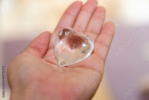 cristal heart on the left hand
