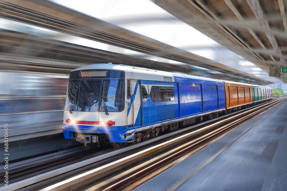 Fototapeta premium Modern high speed train overground metro with motion blur.