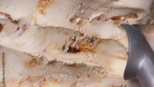 Caramel ice cream Flat lay. Spoon for ice cream making ball.