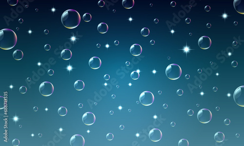 Bubbles in water on dark blue background.