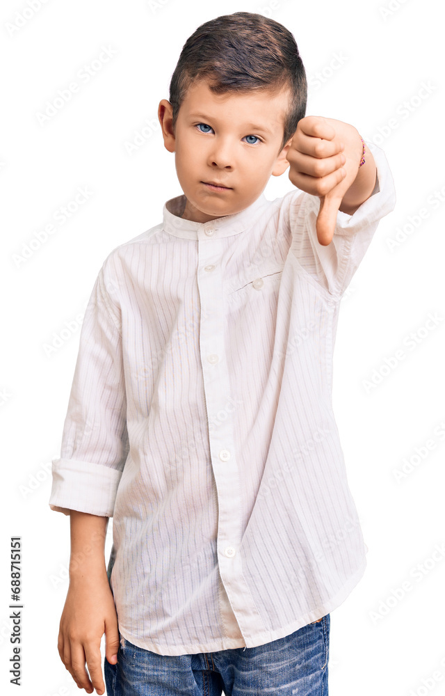Cute blond kid wearing elegant shirt looking unhappy and angry showing rejection and negative with thumbs down gesture. bad expression. Cute blond kid wearing elegant shirt looking unhappy and angry showing rejection and negative with thumbs down gesture. bad expression.