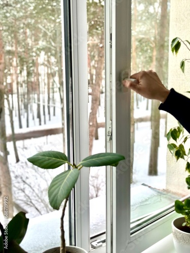 open plastic vinyl window on a winter background
