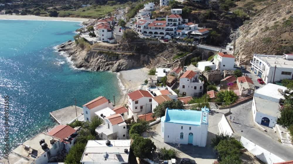 Mediterranean aerial view of small village on the Aegean Sea coast in Ikaria