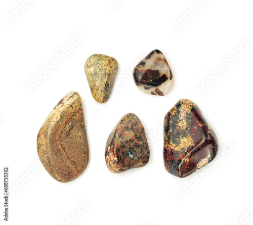 Brown jasper semi-precious gemstones, isolated on white background