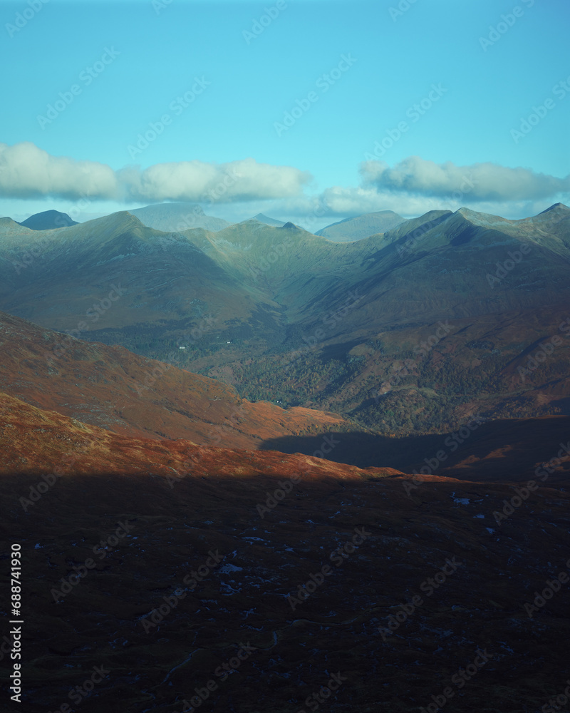 Magnificent landscape of mountain peaks at sunset. View from The Devils Staircase to Binnein Mor that is the highest summit of the Mamores range. Highlands, Scotland