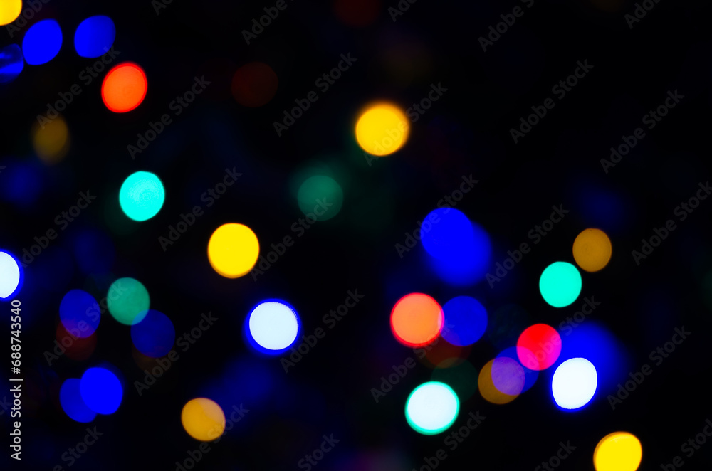 Blurred background lights in the shape of a ball. New Year's background for the designer Blurred background lights in the shape of a ball. New Year's background for the designer