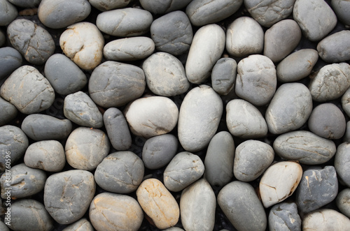 stones on the beach   pebbles on the beach   stone wall background