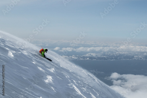 Skier skiing on snow covered slope in Japan