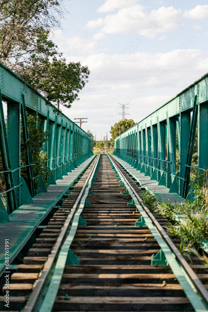 Vanishing Point Perspective on a Green Railway Bridge Vanishing Point Perspective on a Green Railway Bridge