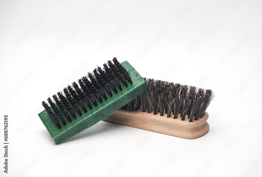 Shoe brushes on white background. Footwear care Shoe brushes on white background. Footwear care