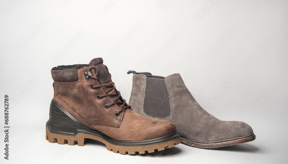 Suede and leather boot on gray background Suede and leather boot on gray background