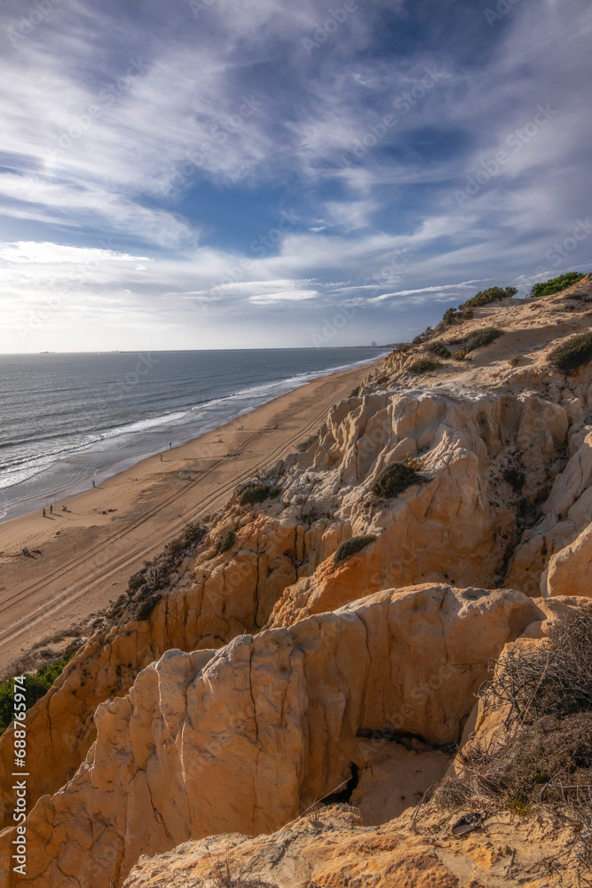El Arenosillo beach is characterized by being a virgin beach of fine, golden sand. Its cliffs make it unique. Pure nature, full of pine trees and native vegetation. One of the best beaches in Spain.