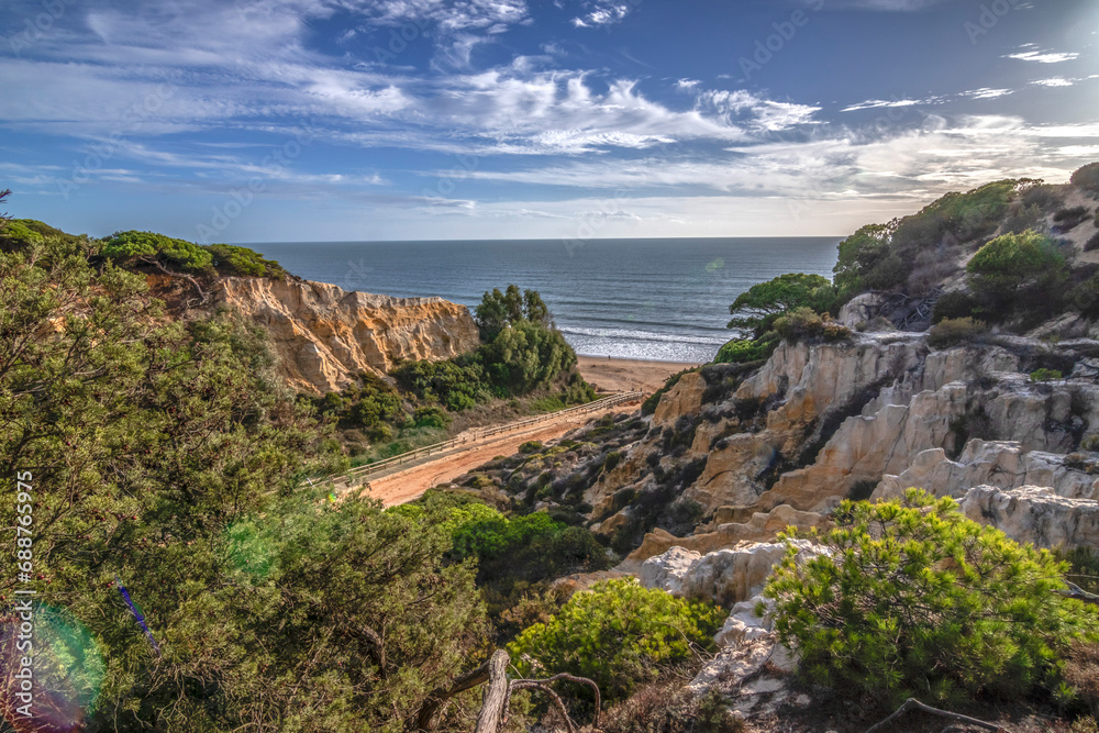 El Arenosillo beach is characterized by being a virgin beach of fine, golden sand. Its cliffs make it unique. Pure nature, full of pine trees and native vegetation. One of the best beaches in Spain.