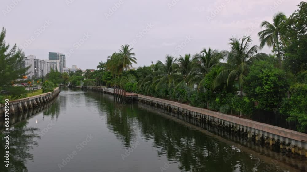 Scenic cityscape showcasing Biscayne Bay and Miami Beach on cloudy summer day in USA. Scenic cityscape showcasing Biscayne Bay and Miami Beach on cloudy summer day in USA.