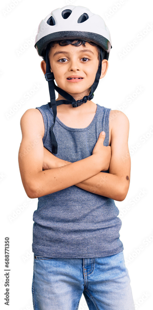 Little cute boy kid wearing bike helmet happy face smiling with crossed arms looking at the camera. positive person. Little cute boy kid wearing bike helmet happy face smiling with crossed arms looking at the camera. positive person.