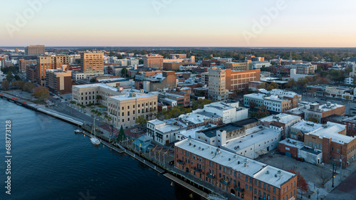 Aerial view of historic downtown Wilmington, NC. Riverwalk next to the Cape Fear River. © Red Lemon