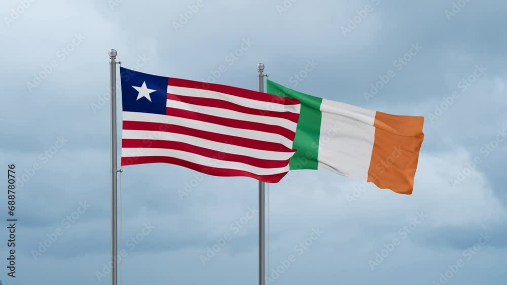 Ireland flag and Liberia flag waving together on cloudy sky, endless seamless loop, two country relations concept Ireland flag and Liberia flag waving together on cloudy sky, endless seamless loop, two country relations concept