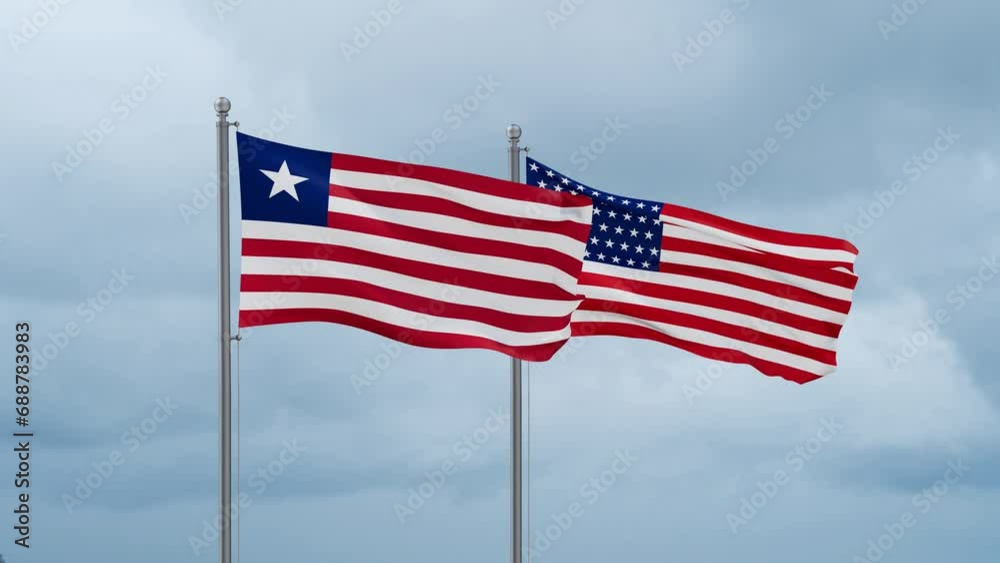 USA and Liberia flag waving together on cloudy sky, endless seamless loop, two country cooperation concept USA and Liberia flag waving together on cloudy sky, endless seamless loop, two country cooperation concept