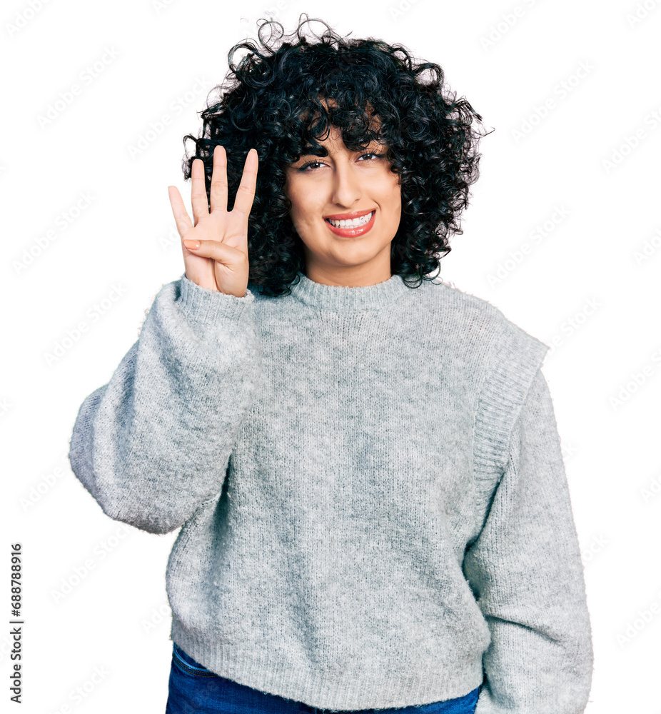 Young middle east girl wearing casual clothes showing and pointing up with fingers number four while smiling confident and happy. Young middle east girl wearing casual clothes showing and pointing up with fingers number four while smiling confident and happy.