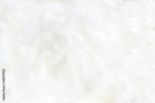 organic coconut cream oil white cream texture background photo