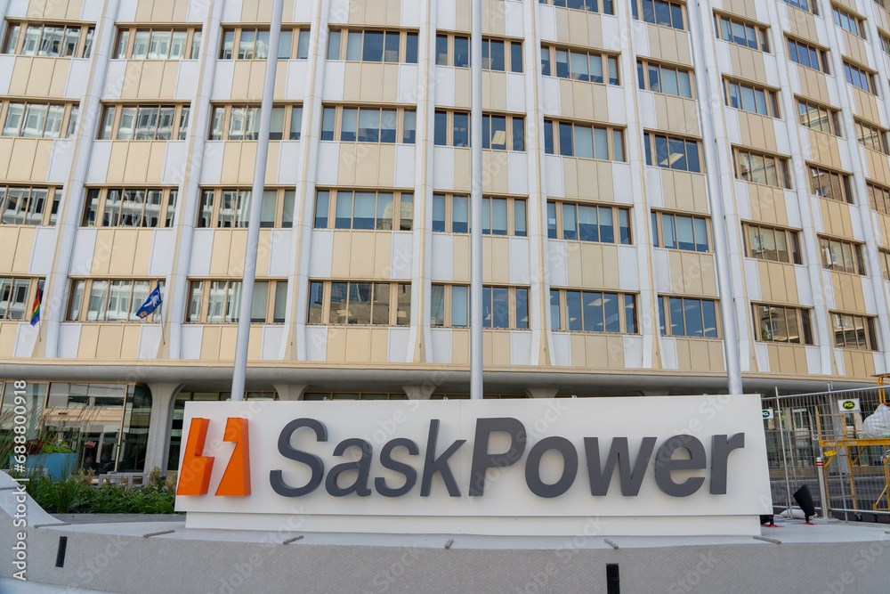 SaskPower logo and sign in front of SaskPower headquarters building in Regina, Saskatchewan