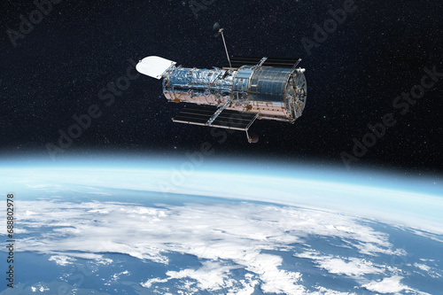 The Hubble space telescope on orbit of Earth planet. Space observatory research. Elements of this image furnished by NASA.