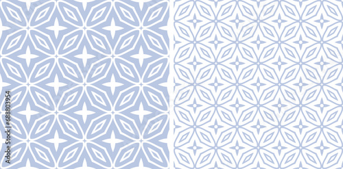 Set of Abstract Seamless Geometric Light Blue and White Patterns. © troyka
