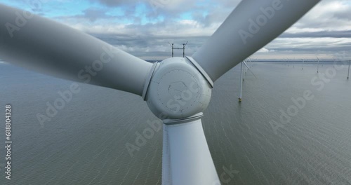 Offshore wind turbine wind park. Aerial drone view. photo
