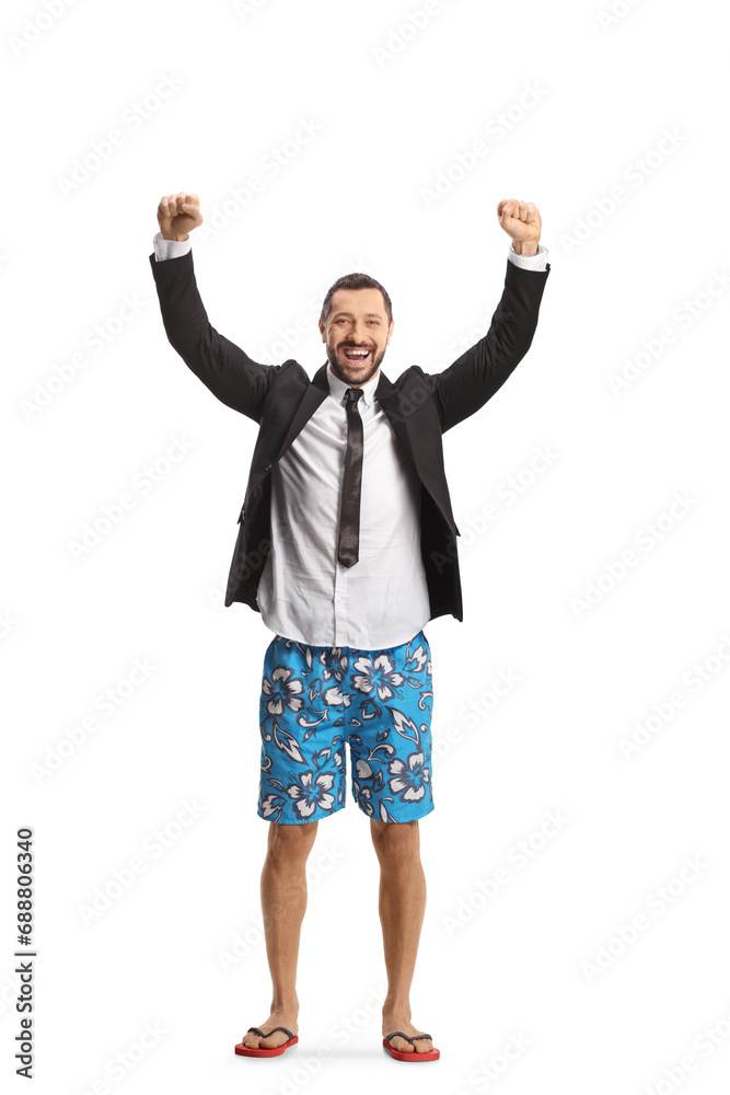 Full length portrait of a happy businessman in a suit swimming shorts Full length portrait of a happy businessman in a suit swimming shorts
