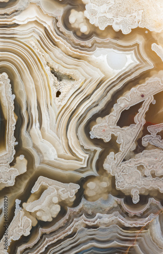 Natural agate stone with beautiful layered patterns photo