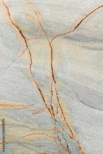 Detailed beige marble texture with orange veining