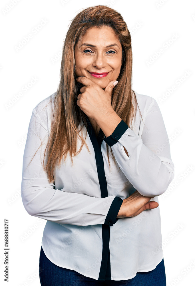 Middle age latin woman wearing business shirt looking confident at the camera smiling with crossed arms and hand raised on chin. thinking positive. Middle age latin woman wearing business shirt looking confident at the camera smiling with crossed arms and hand raised on chin. thinking positive.