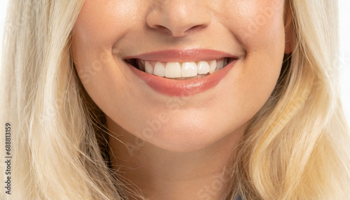 young woman smiling, closeup on lips
