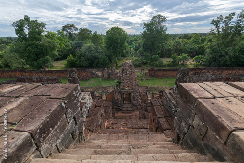 Ancient stone steps of a Cambodian temple ruin photo