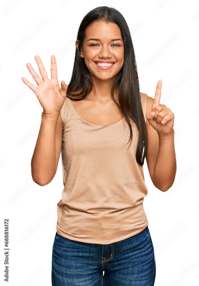 Beautiful hispanic woman wearing casual clothes showing and pointing up with fingers number six while smiling confident and happy. Beautiful hispanic woman wearing casual clothes showing and pointing up with fingers number six while smiling confident and happy.