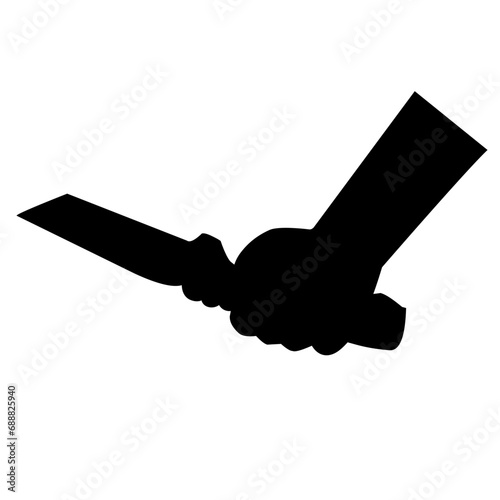 Shadow of killing knife in hand