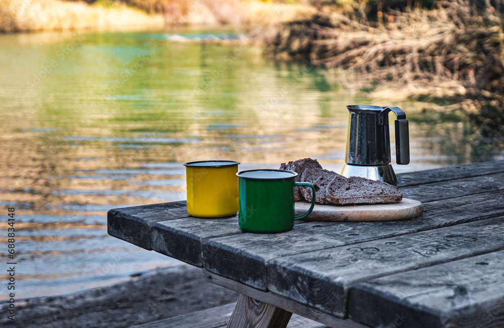 Serene Breakfast: Bread and Coffee on the Quiet Bank. Serene Breakfast: Bread and Coffee on the Quiet Bank.