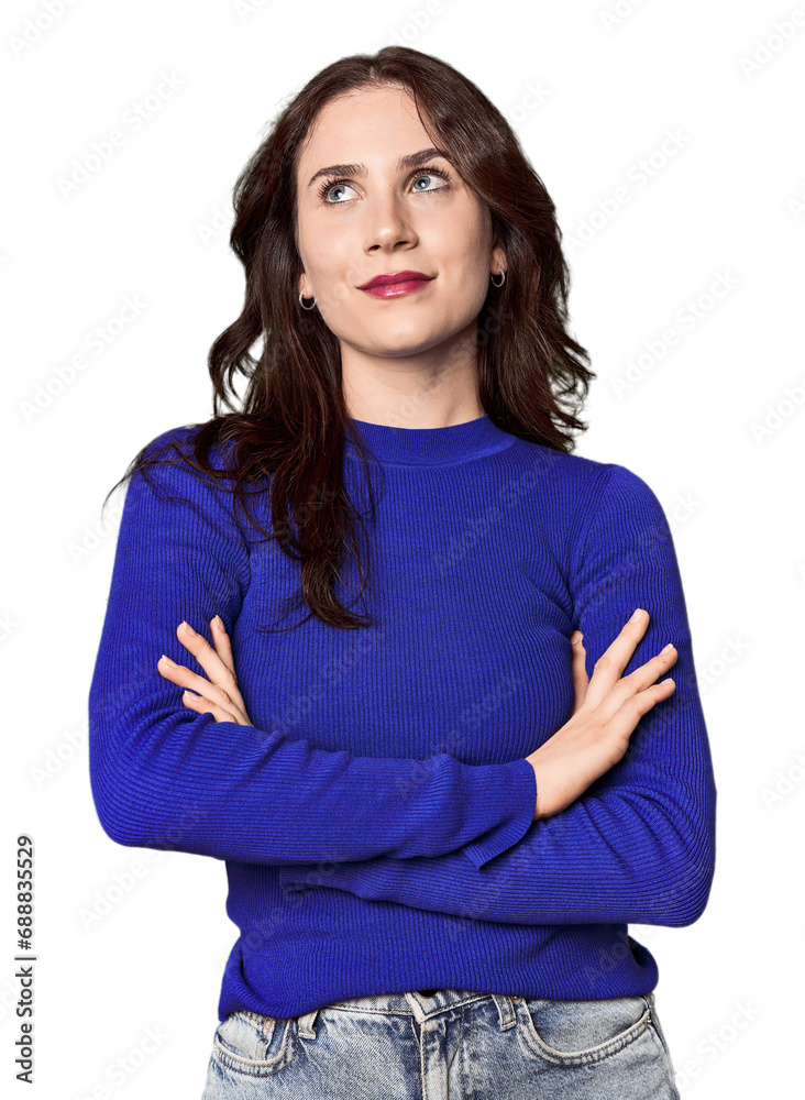 Young Caucasian woman in a studio setting dreaming of achieving goals and purposes Young Caucasian woman in a studio setting dreaming of achieving goals and purposes