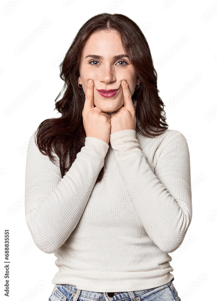 Young Caucasian woman in a studio setting doubting between two options. Young Caucasian woman in a studio setting doubting between two options.