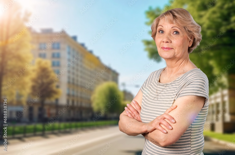 Middle age woman standing with crossed arms gesture