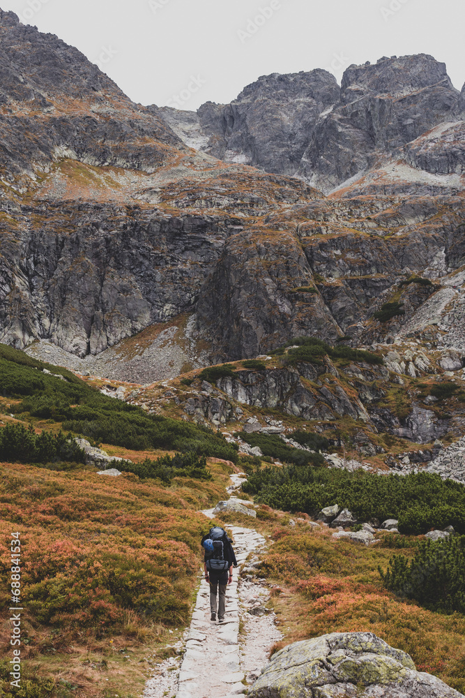 Hiker on the path in the  Tatra Mountains in Poland.