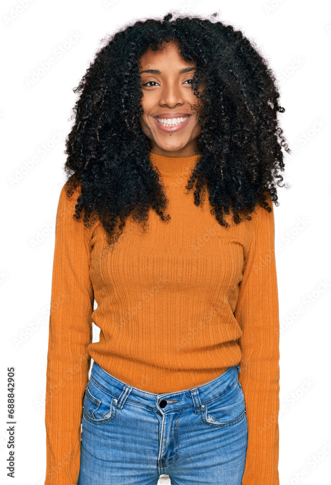 Young african american girl wearing casual clothes with a happy and cool smile on face. lucky person. Young african american girl wearing casual clothes with a happy and cool smile on face. lucky person.
