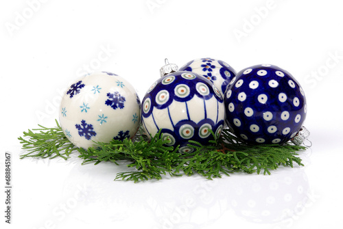 christmas art ceramic hand decorated ball blue and white isolated photo