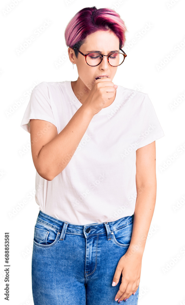 Young beautiful woman with pink hair wearing casual clothes and glasses feeling unwell and coughing as symptom for cold or bronchitis. health care concept. Young beautiful woman with pink hair wearing casual clothes and glasses feeling unwell and coughing as symptom for cold or bronchitis. health care concept.