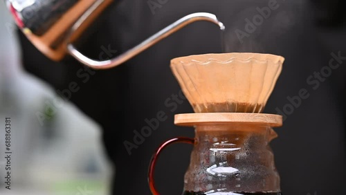 コーヒーミルでコーヒー豆を挽く  photo