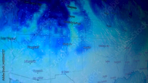 Cold weather wave over USA North America Shot of a computer screen. Weather satellite view map. Precipitations, temperatures, air pressure. Meteorology live view countries continents.